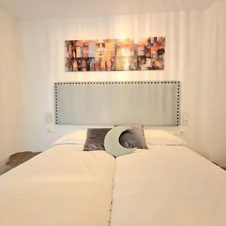 En El Centro Bajo A *