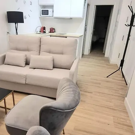 En El Centro Bajo A *